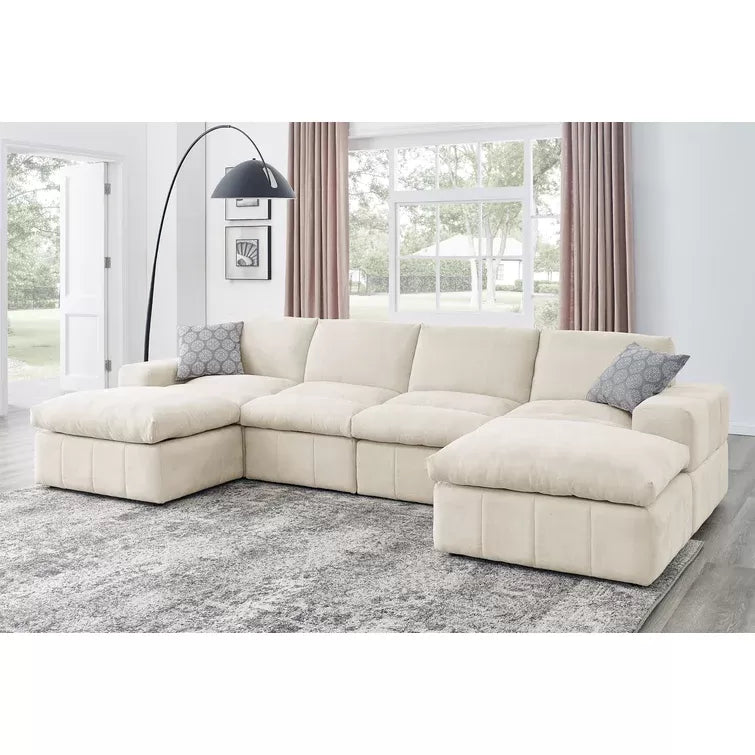 Anchoretta 134" Wide Reversible Modular Sectional with Ottoman
